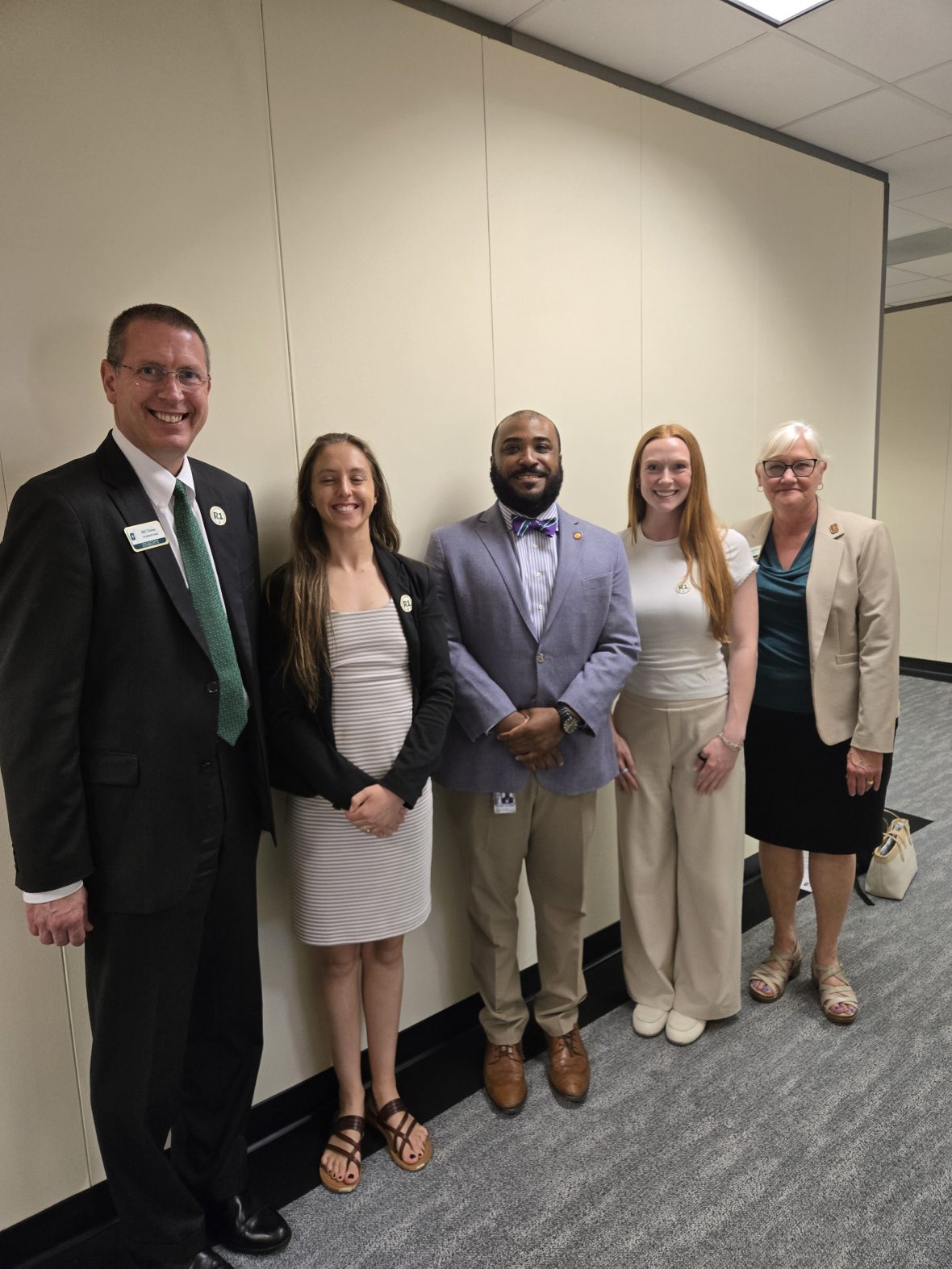 Graduate students and administrators with Rep. Brown 